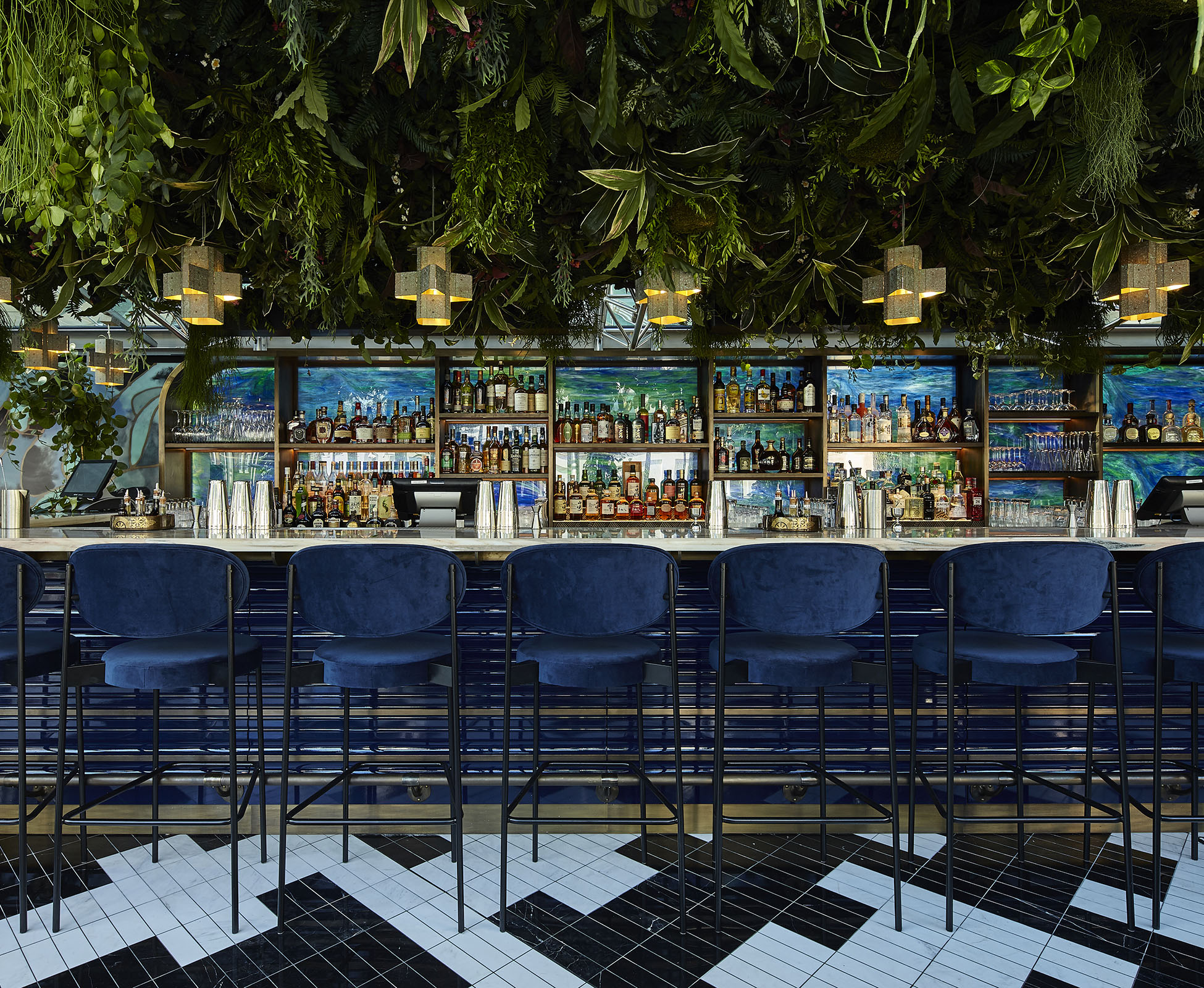 A suspended living ceiling of plants hovers above the cocktail bar at Sushisamba Covent Garden. It is created using a diverse range of plants from Asia and South America to reflect the restaurant’s origins.